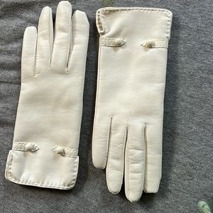 White leather gloves
